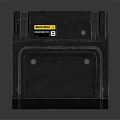 Black Industrial Equipment With Yellow Warning Label And Rugged Square Design