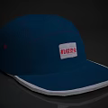 Blue Textured Hat With White Brim And White Label Featuring Red Text 3d model