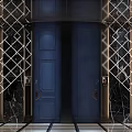 KTV Corridor Design With Diamond Patterned Marble Walls Dark Blue Doors And Strip Lights