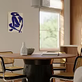 Modern Minimalist Dining Room with Round Dining Table Pendant Lights Chairs and Wooden Cabinet