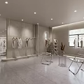 Modern Spacious Clothing Store Interior With Clothing Racks Sofa Display Counter And Skylight