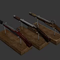 Two Antique Rifles With Wooden Stocks And Metal Components On Display Stands