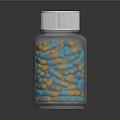 Colorful Blue And Yellow Candy Pieces In Clear Glass Bottle With White Lid