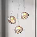 Minimalist Modern Transparent Glass Pendant Lights With Irregular Spherical Yellow Light Source Hanging White Background