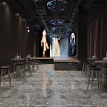 Modern Indoor Space With Dark Curtains Wooden Flooring Rows Of Tables Chairs And Ceiling Screens