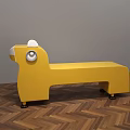 Yellow Animal Shaped Public Chair With Ears Eyes And Wheels On Wooden Floor