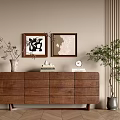 Wooden Console Table On Light Brown Wall With Vase Books Clock Framed Artworks Green Plant