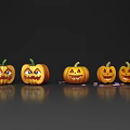 Carved Pumpkins with Different Carved Faces and Reflections on Dark Background with Candies