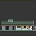 Small Building With Green Roof White Walls Windows Antenna And Sign