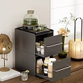 Modern Black Cabinet Interior With Open Drawers Displaying Tea Set And Accessories