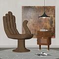 Unique Brown Sculptural Chair with Side Table Books Abstract Painting Pendant Lamp and Round Rug