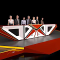 Seven People Standing On Unique Geometric Stage With Red And White Design