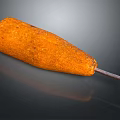 Orange Conical Shaped Household Tool With Textured Surface And Metal Pin