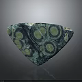 Triangular Teal Green Stone Decorative Piece With Circular Patterns And Natural Texture