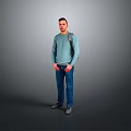 Man Wearing Blue Sweater And Jeans Carrying Backpack Standing Against Gray Background