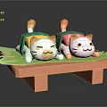 Cartoon Cat Dolls In Different Colored Clothes Lying On Green Leaves Over Orange Small Table