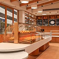 Modern Dessert Shop Interior With Glass Display Cases And Wooden Counter Holding Fresh Desserts