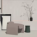 Modern Beige Leisure Chair with Green Side Stool and Artwork in Minimalist Interior