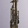 Elegant Brass Saxophone Musical Instrument Featuring Shiny Metal Body And Detailed Key Design