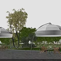 White Arched Canopies in Outdoor Garden with Wooden Tables and Chairs Surrounded by Trees