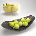 Fresh Green Pears Arranged In Glass Bowl And Black Plate On White Background