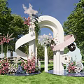 Outdoor Heart Shaped Arch With Pink White Flowers Ribbon And Floral Decorations On Grassy Lawn