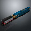 Blue Model Train Locomotive Pulling Gray Freight Car With Metal Design