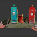 Vintage Blue And Red Fuel Pumps With Rusty Tire And Traffic Cones On Stone Base