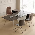 Modern Office Desk Setup With Black Top Silver Legs Laptop Vase And Ergonomic Chairs