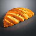 Freshly Baked Golden Brown Braided Bread With Shiny Surface On Dark Background