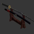 Traditional Japanese Katana on Wooden Display Stand with Red String Handle Wrapping and Black Scabbard Golden Emblem