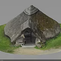 Traditional Thatched Hut with Moss Covered Roof Surrounded by Green Grass and Stone Steps
