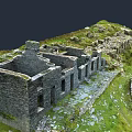 Ancient Stone Ruins Structure With Remnant Walls And Green Grassland