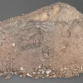 Large Pile Of Brown Soil With Small Stones And Earthy Texture