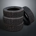 Decorative Ornament Set with Three Stacked Tires and One Tilted Tire