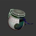 Decorative Blue Glass Jar With Silver Lid Purple Ribbon And Blue Liquid Bubbles