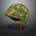 Camouflage Helmet With Green White Pattern Mesh Structure On Orange Stand 3d model