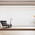 White Vertical Blinds in Modern Living Room with Black Chair Potted Plant and Wooden Floor