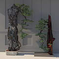 Artistic Bonsai Potted Plants with Black Rock and Red Wooden Base Against Gray Wall
