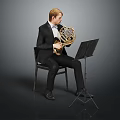 Man in Black Suit With Bow Tie Playing French Horn on Chair Near Music Stand