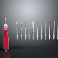 Red Handle Screwdriver With Various Types Of Screwdriver Bits Displayed