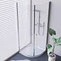 Modern Rain Shower Head in Glass Enclosure with White Blinds Green Plant and Tile Floor