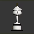 Silver Trophy Featuring Golden Top Decoration And Black Base With Golden Emblem