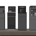 Four Modern Gray Vertical Household Appliances Arranged In A Row With Sleek Design