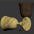 Shiny Gold And Brown Metal Cups One Tilted One Standing On Dark Background