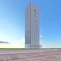 Modern Tall Hotel Building With Glass Facade And Open Surroundings Under Blue Sky