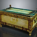 Ornate Wooden Chest With Decorative Carvings Green Accents And Small Feet