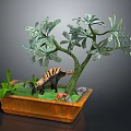 Potted Indoor Plant with Green Leaves Brown Pot Dinosaur Figure and Small Stones