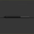 Black Wacom Digital Drawing Tablet with Dot Pattern Surface and Stylus Pen