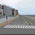 Modern Municipal Road With Pedestrian Walkway Green Median Street Lamps And Modern Buildings